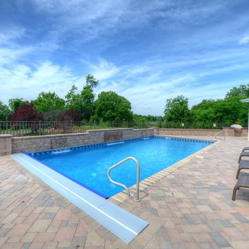 Traditional Pool with Retractable Cover