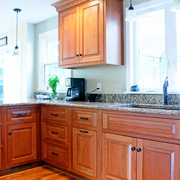 Medium Cherry Transitional Kitchen with Peninsula