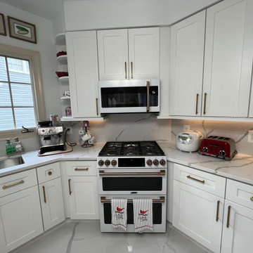 White Shaker Kitchen Remodel with Marble-Look Porcelain Floor in Arlington, VA