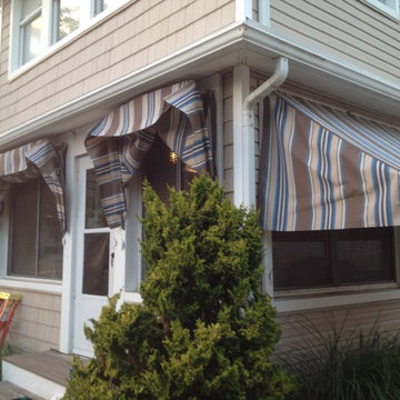 Traditional window awnings (retractable)