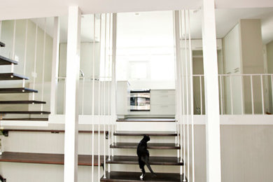Inspiration for a modern staircase remodel in Houston