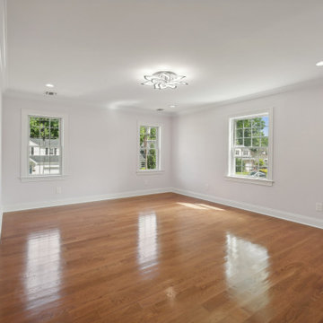 Bedroom with Sloped Ceiling and Closet Wall