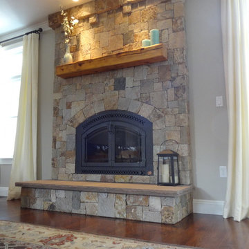 Combining Colonial Tan Natural Stone with Olive Green Siding