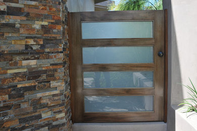 Inspiration for a modern entryway remodel in Orange County