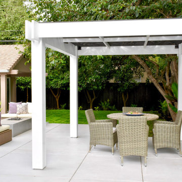 Custom Pergola with Artistic Cut-Out Trellis and Inviting Outdoor Spaces