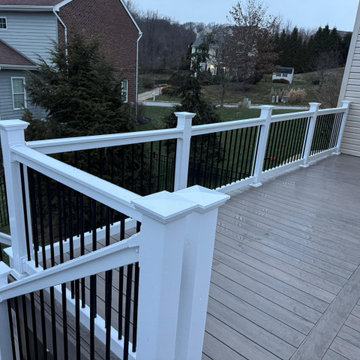 Expansive Elevated Composite Deck with Two-Tone Railing