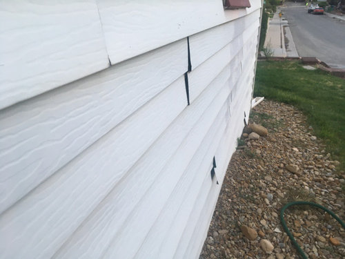 Siding gapping at the joints.