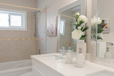 Example of a small trendy 3/4 double-sink bathroom design in Toronto with shaker cabinets, white cabinets, quartzite countertops, white countertops and a built-in vanity