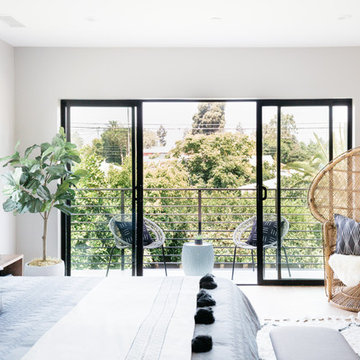 Beachy Boho Master Bedroom with Peacock Chair