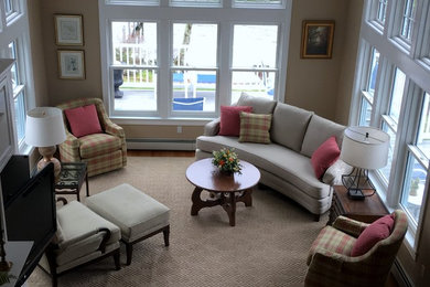 Small elegant medium tone wood floor sunroom photo in Boston with a standard ceiling