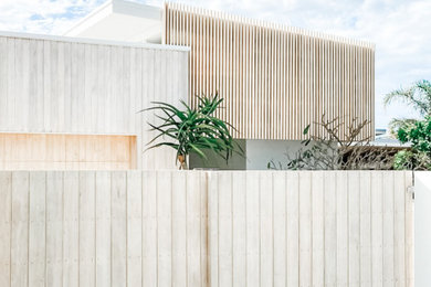 Design ideas for a contemporary white exterior in Sunshine Coast.