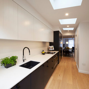 Black and White Kitchen with Skylight