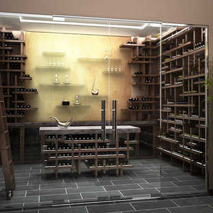 Design ideas for a contemporary wine cellar in Sussex.