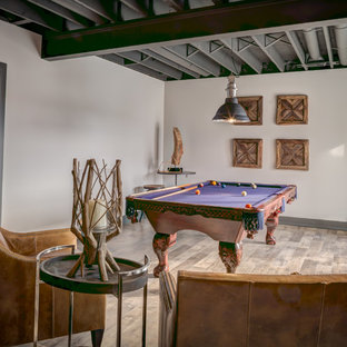 This is an example of a rural basement in Cleveland with vinyl flooring and no fireplace.