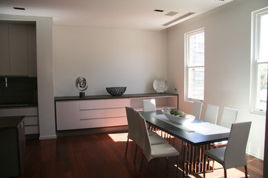 Design ideas for a mid-sized contemporary home design in Perth.