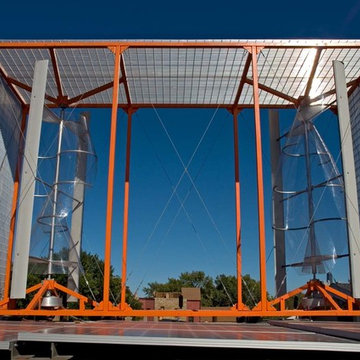Two vertical-axis wind turbines provide a portion of the home's electricity.