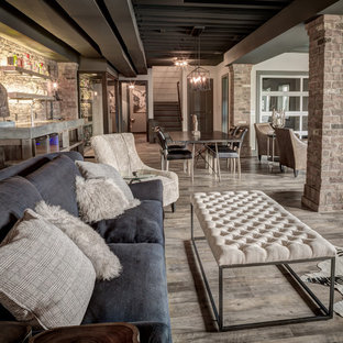 Imagen de sótano con puerta campestre, grande, sin chimenea, con suelo vinílico