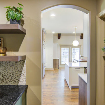 Collected Kitchen Remodel with Custom Seating + Layered Details