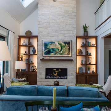 Sea Toned Contemporary Living Room with Striking Stone Firepalce