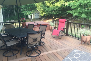 Mid-sized elegant backyard deck photo in Boston with no cover