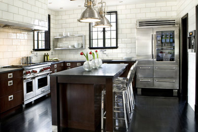 Kitchen - contemporary l-shaped kitchen idea in Atlanta with soapstone countertops