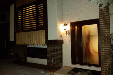 Inspiration for a timeless exterior home remodel in Calgary