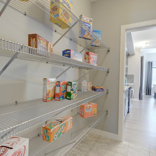 Mid-sized craftsman kitchen pantry designs - Inspiration for a mid-sized craftsman galley kitchen pantry remodel in Edmonton