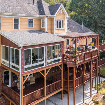 Multi-Level Outdoor Living with Sunroom and Grill Deck