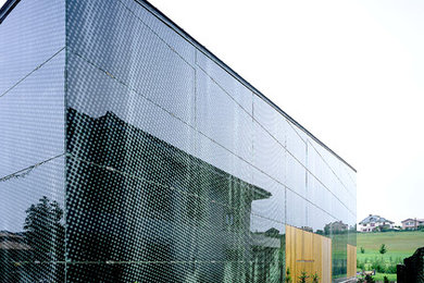 Example of a trendy exterior home design in Other