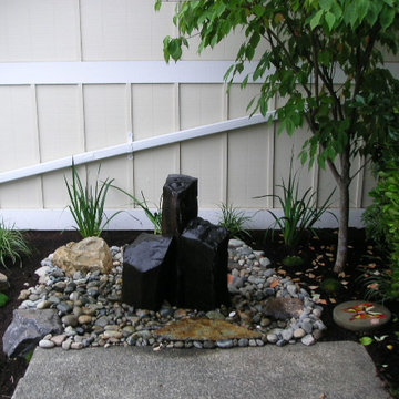 Drilled Columbia Mini Columns surrounded byRiver rock