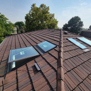 Velux Solar-Powered Venting Skylights on Stone-Coated Steel Roof