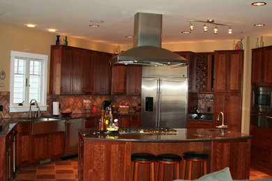 Example of a mid-sized classic ceramic tile open concept kitchen design in DC Metro with a farmhouse sink, flat-panel cabinets, medium tone wood cabinets, brown backsplash, ceramic backsplash and stainless steel appliances