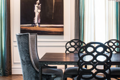 This is an example of an eclectic dining room in San Francisco with white walls.