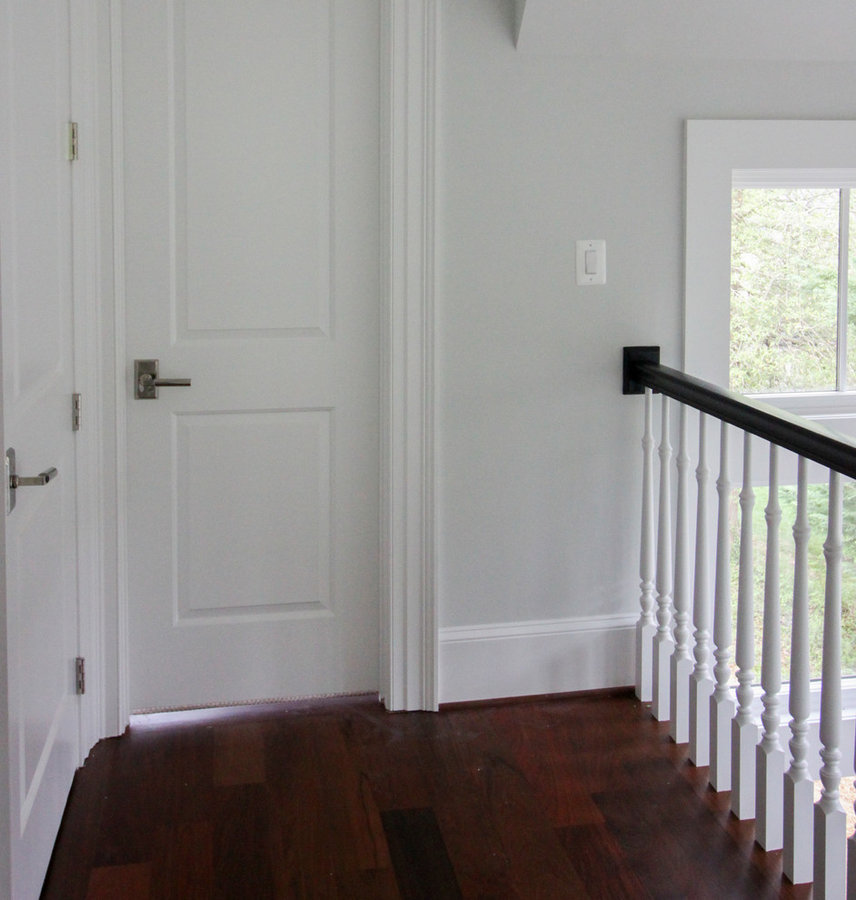 Powerful Impression by Floating Staircase in Suburban Foyer