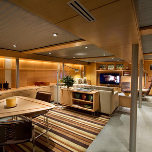 Diseño de sótano con ventanas retro, de tamaño medio, sin chimenea, con paredes marrones, suelo de baldosas de cerámica y suelo gris