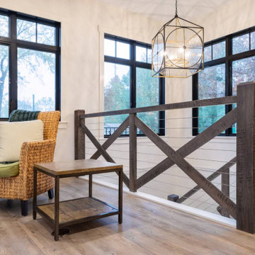 Elegant Farmhouse Interior with Rustic Mantle on Fireplace