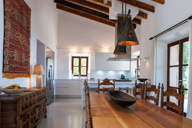 Inspiration for a mediterranean dining room remodel in Other