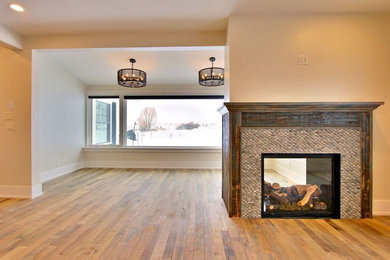 Example of a mountain style sunroom design in Denver