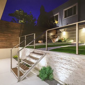 Stainless steel cable railing, custom made staircase with wooden steps.