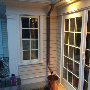 The Roofer's copper Downspouts