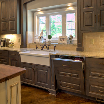 Rustic Alder cabinetry with painted and glazed island.