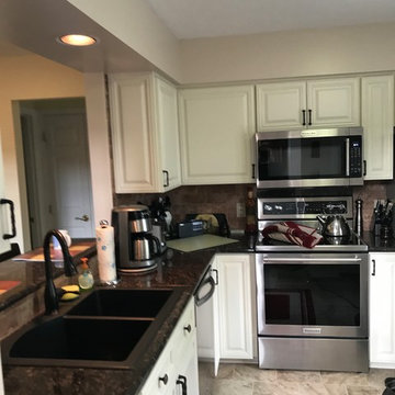 cabinet refacing---antique white raised panel