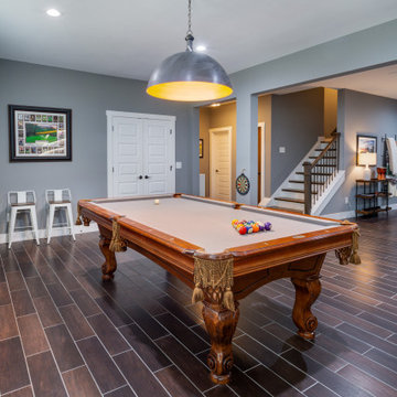GOLF SIMULATOR, WINE CELLAR, AND BASEMENT BAR