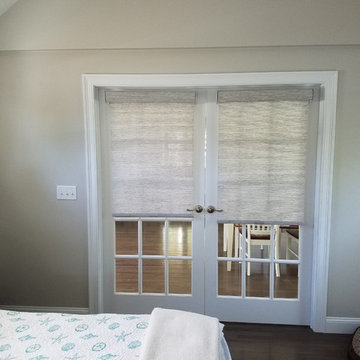 Cordless solar roller shade with matching fabric valance