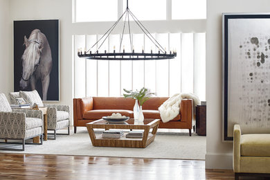 Small trendy formal and open concept medium tone wood floor and brown floor living room photo in Other with white walls, no fireplace and no tv