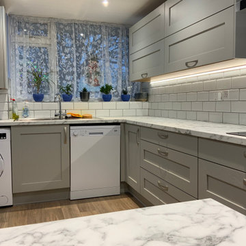 Grey shaker kitchen with marble look laminate worktops