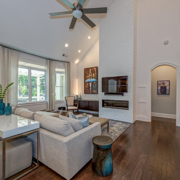 The Great Room features a full height brick fireplace with modern firebox (TV ab