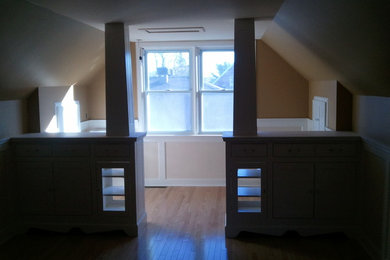 Mid-sized master light wood floor bedroom photo in Ottawa with brown walls and no fireplace