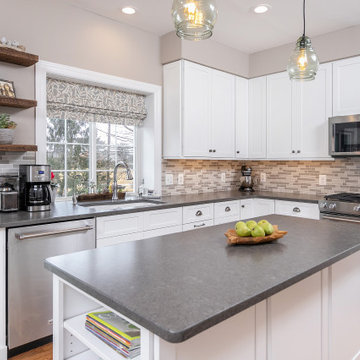 Kitchen with White Shaker Cabinetry (and WIne Rack & open shelving)