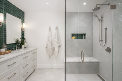 Large trendy master green tile white floor bathroom photo in Vancouver with white cabinets, a one-piece toilet, white walls, white countertops and a built-in vanity